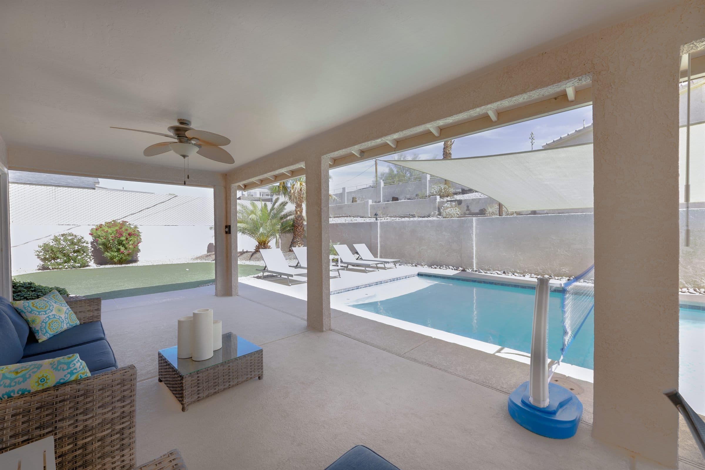 Patio seating beside the private pool